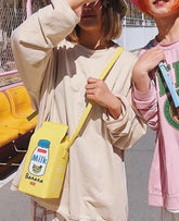 Sweeten your style with the Banana Milk Carton Kawaii Street Style Shoulder Bag playful and trendy accessory inspired by kawaii streetwear culture. Its unique milk carton shape and charming design make it the perfect statement piece for everyday wear or special outings.